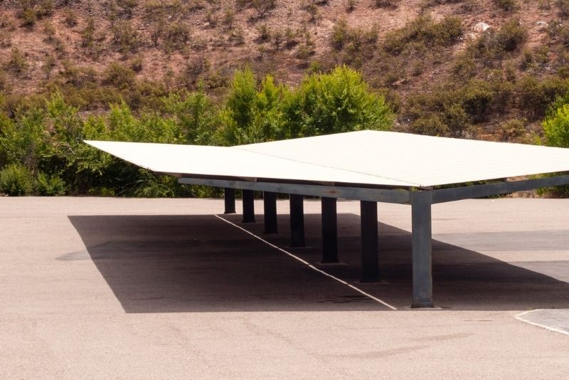 A photo of a long steel carport